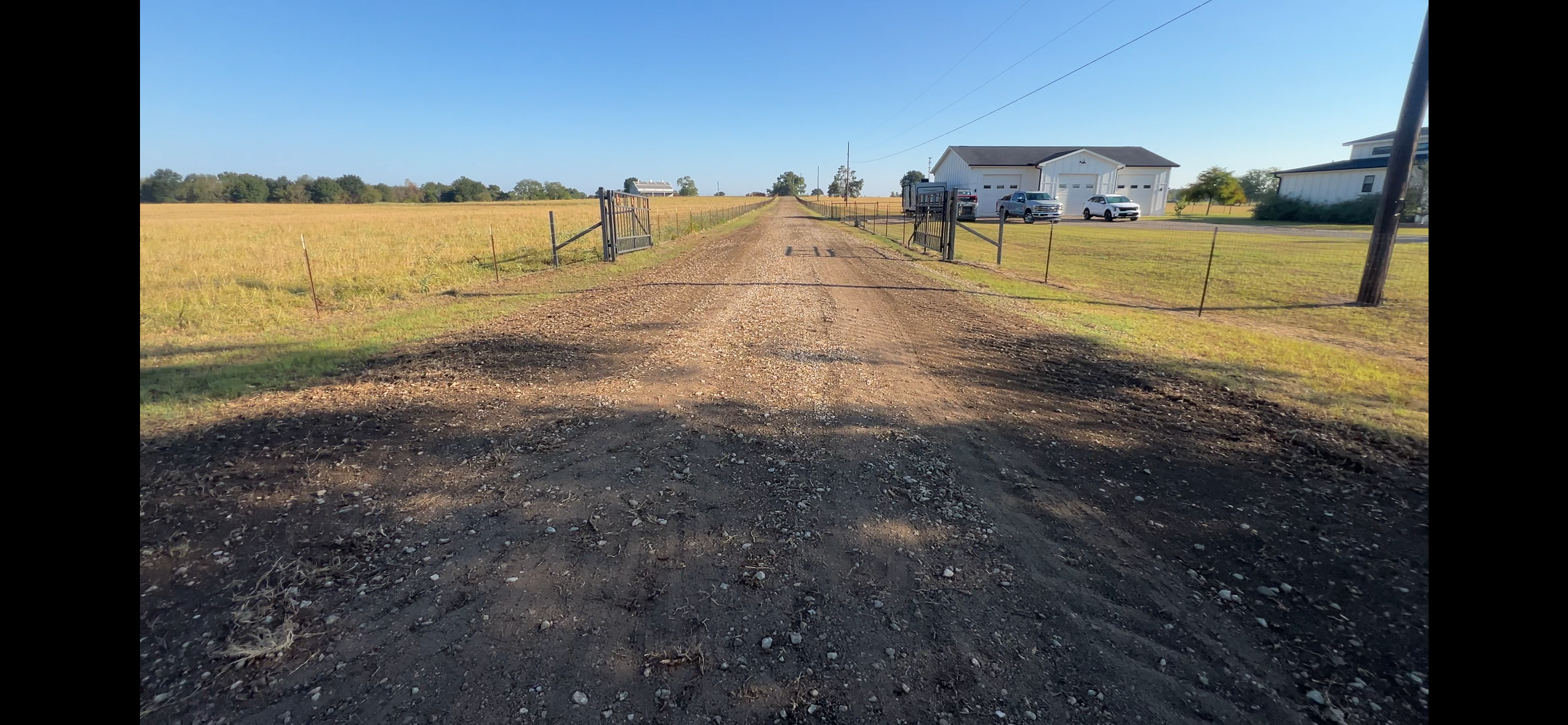 Rural dirt road on a farm property